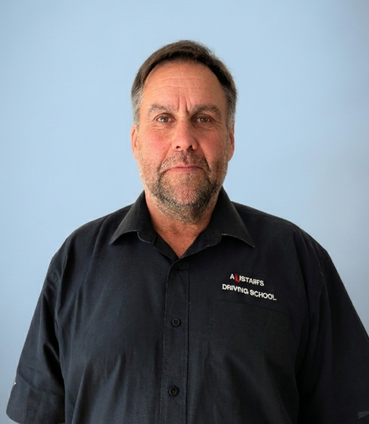 A portrait photo of Alistair